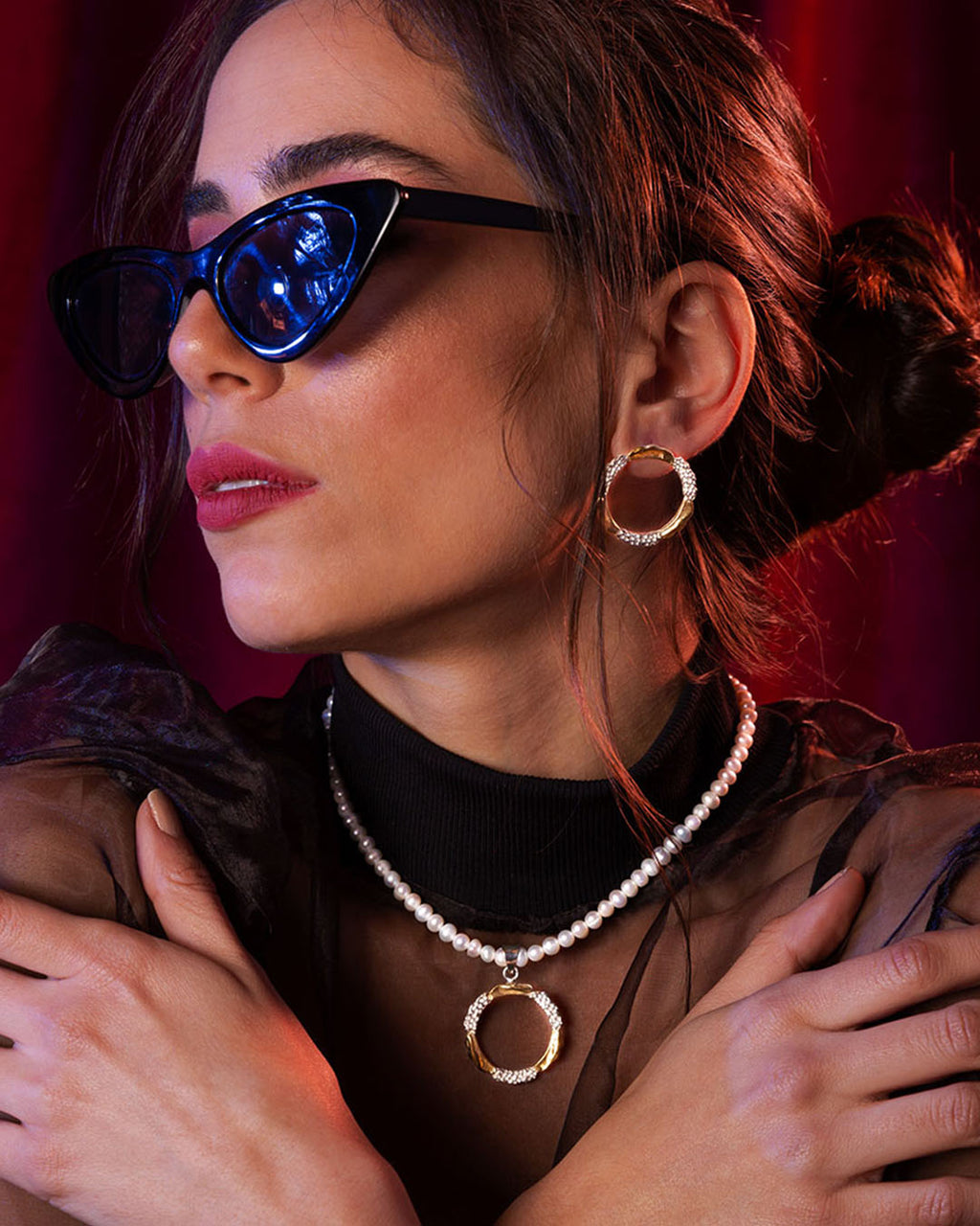 Mixed-metal Amusement pendant with gold and hammered silver textures on a white pearl strand necklace