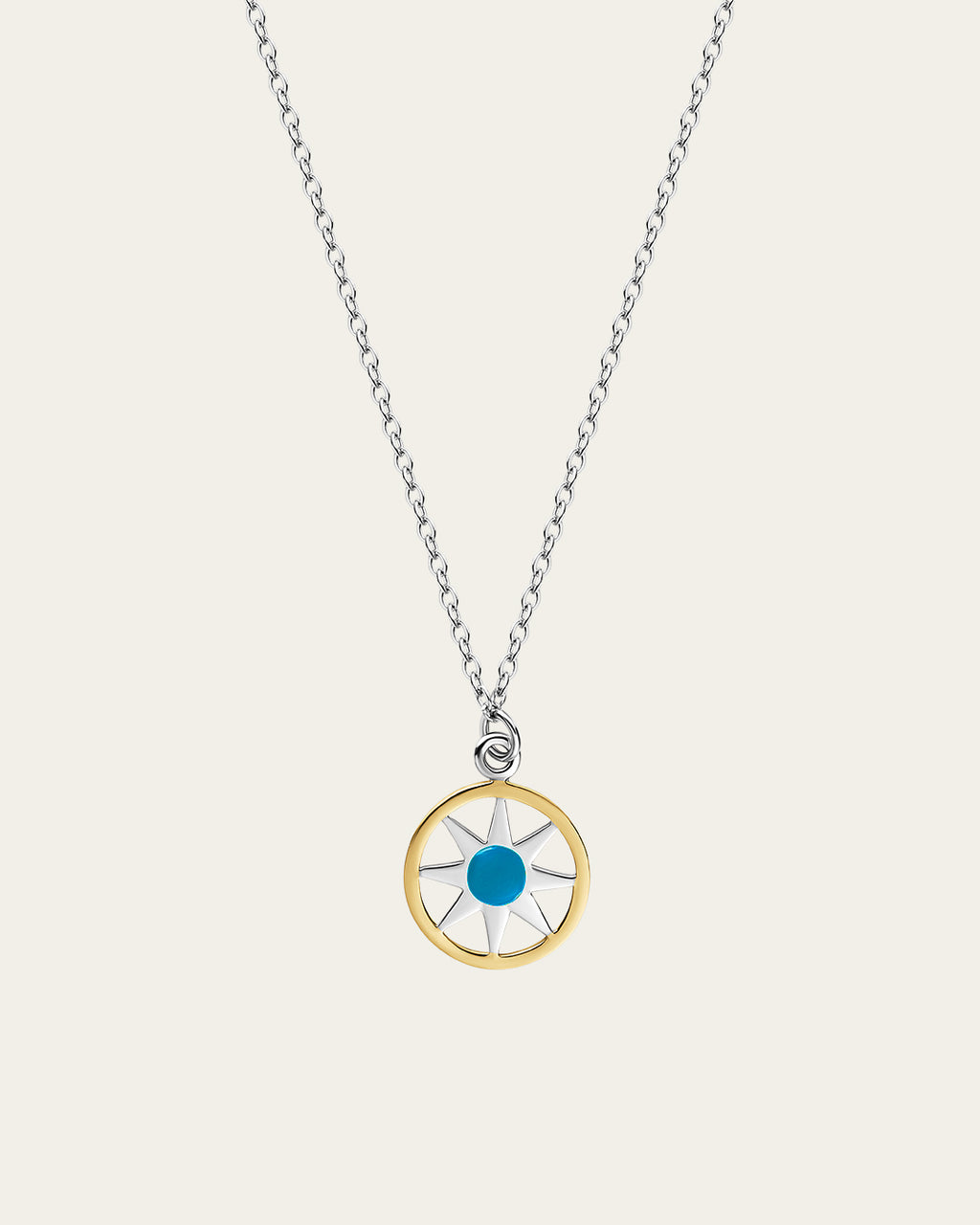 Ancient Sun pendant necklace in gold with a sunburst motif and a delicate adjustable chain.