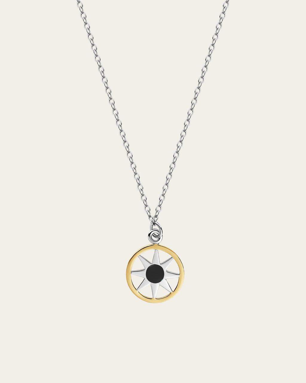 Ancient Sun pendant necklace in sterling silver and 18k gold plating with a sunburst motif and a delicate adjustable chain.