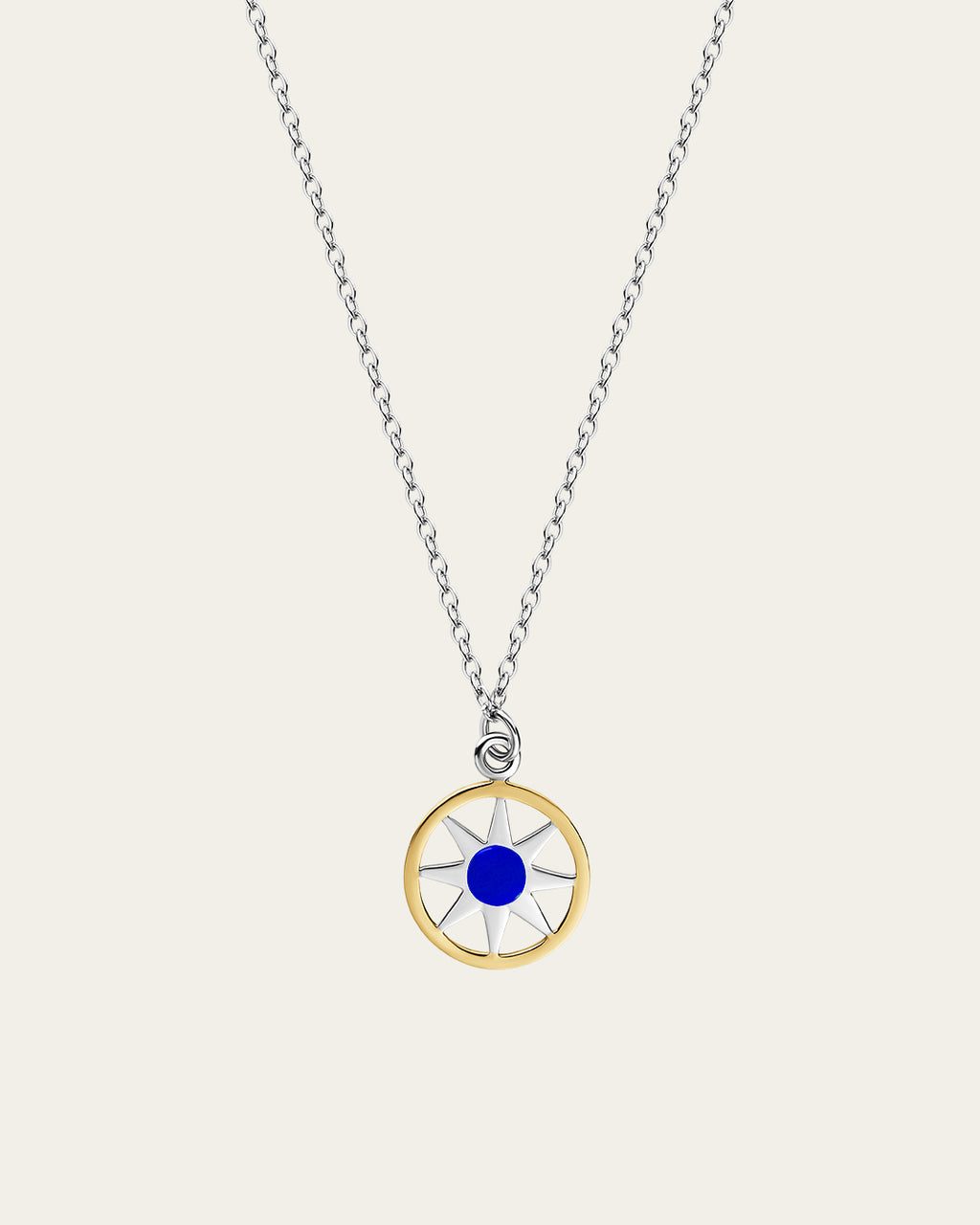 Ancient Sun pendant necklace in sterling silver and 18k gold plating with a sunburst motif and a delicate adjustable chain.