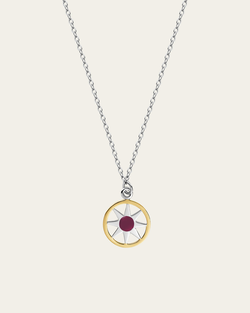 Ancient Sun pendant necklace in sterling silver and 18k gold plating with a sunburst motif and a delicate adjustable chain.
