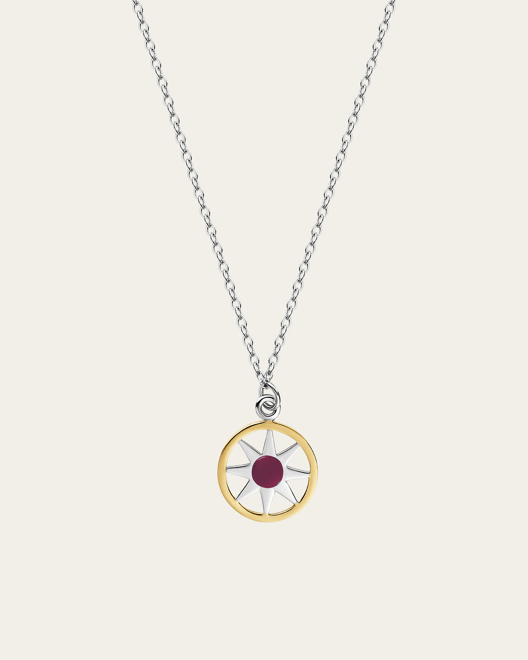 Ancient Sun pendant necklace in sterling silver and 18k gold plating with a sunburst motif and a delicate adjustable chain.
