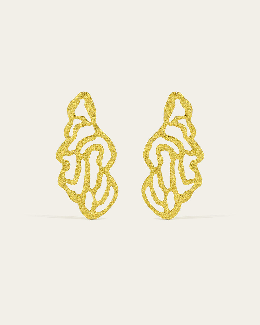 Coral earrings by Ann Elsaban Jewelry in 18K gold-plate, organic coral-inspired sculptural earrings with fluid forms and a polished finish, worn as an elegant statement piece