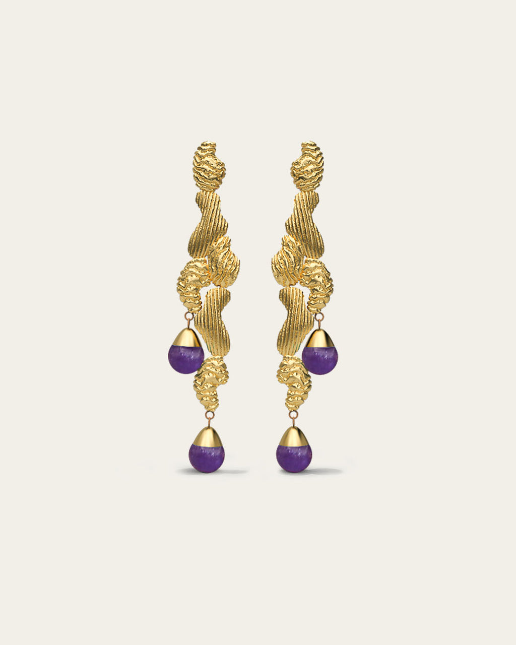 Handcrafted Fluva earrings in 18k gold plated silver with a bold, sculptural shape inspired by flowing water.