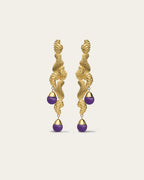 Handcrafted Fluva earrings in 18k gold plated silver with a bold, sculptural shape inspired by flowing water.