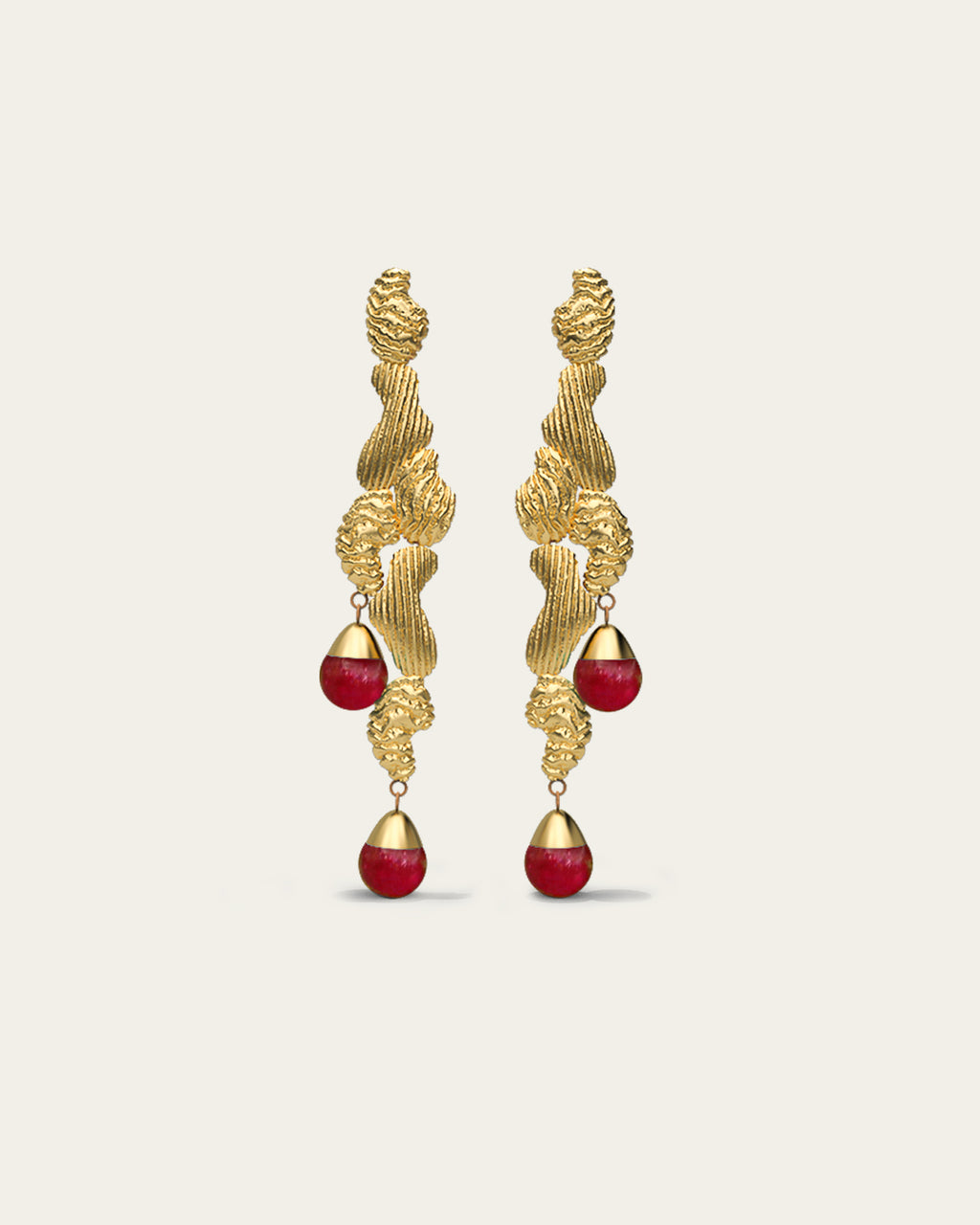 Handcrafted Fluva earrings in 18k gold plated silver with a bold, sculptural shape inspired by flowing water.