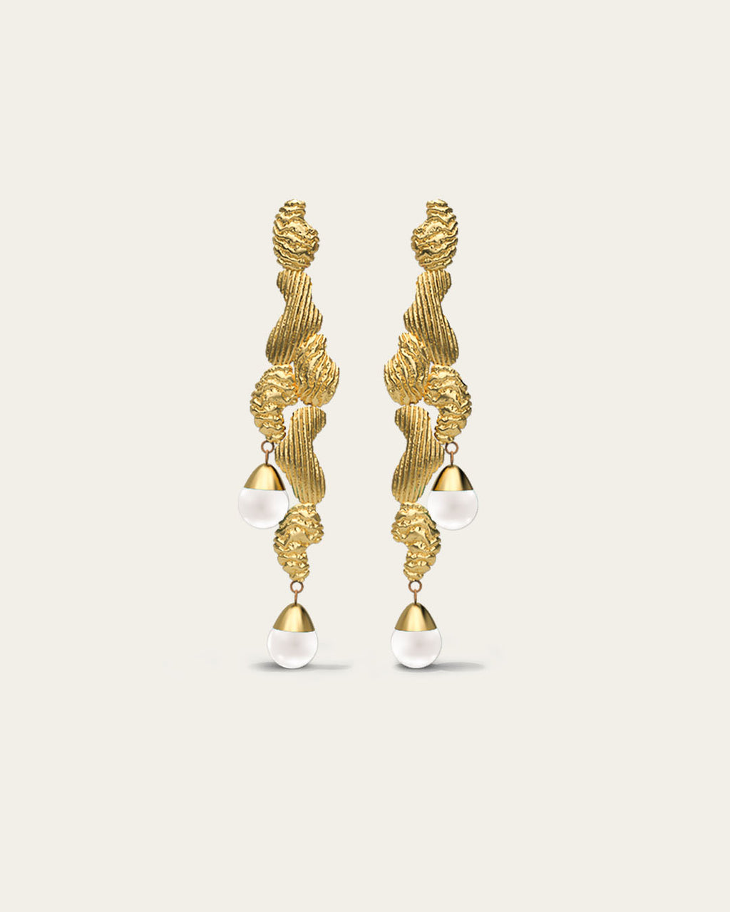 Handcrafted Fluva earrings in 18k gold plated silver with a bold, sculptural shape inspired by flowing water.