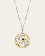 Sterling silver Eye of Horus necklace with protective symbolism and textured geometric accents.