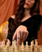 Contemporary Memory ring in polished silver-tone metal with an asymmetrical, sculptural open-work design