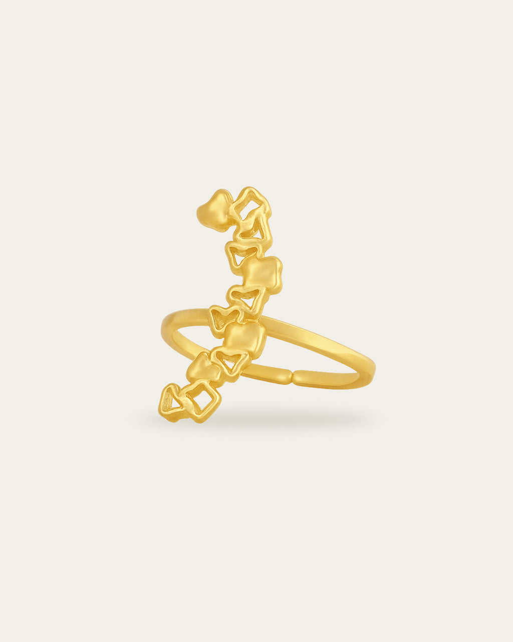Handcrafted Ripple gold ring with an organic, wavy silhouette featuring small abstract geometric cutouts