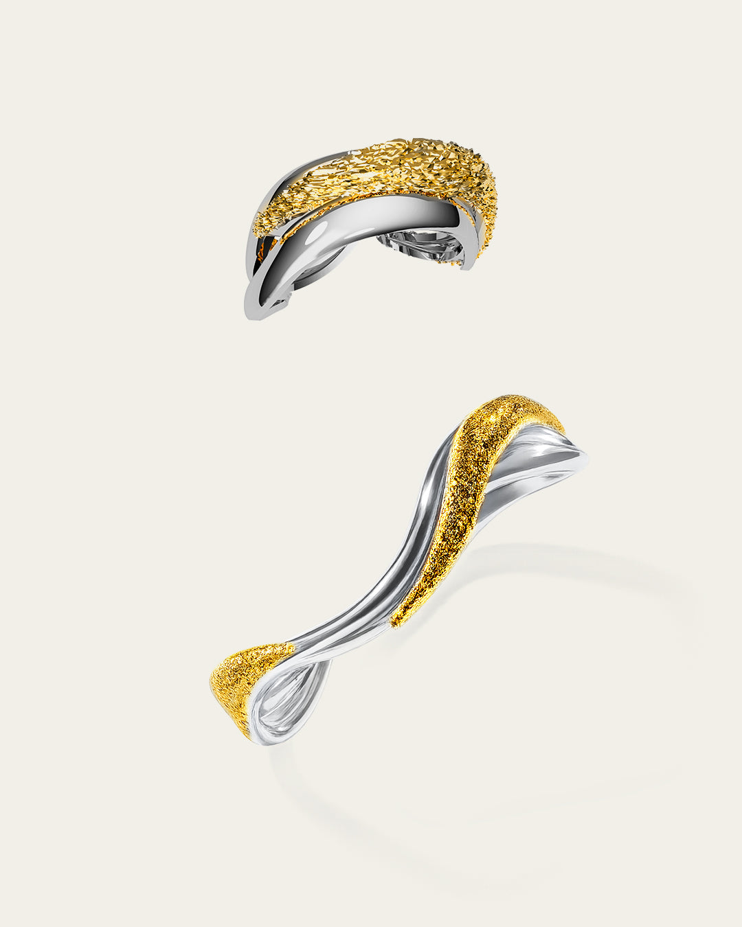 Rivera bangle and ring set in 18k gold-plated brass featuring smooth, sculptural organic forms.