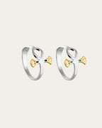 Pair of sterling silver rings with 18k gold plated accents, inspired by the ankh symbol