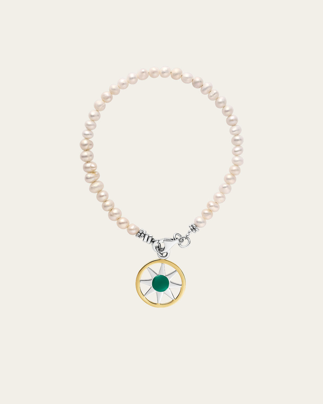 sterling silver and 18k Gold Ancient Sun link bracelet with multiple sunburst charms and a secure lobster clasp, white pearl beads