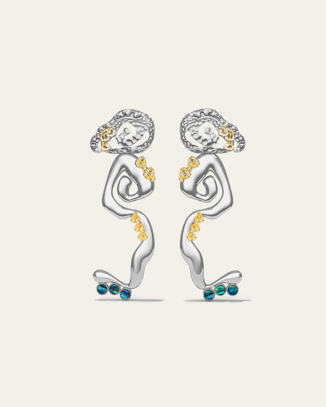Statement Cascade drop earrings in 18k gold plated metal with a fluid, liquid-gold waterfall silhouette