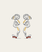 Statement Cascade drop earrings in 18k gold plated metal with a fluid, liquid-gold waterfall silhouette