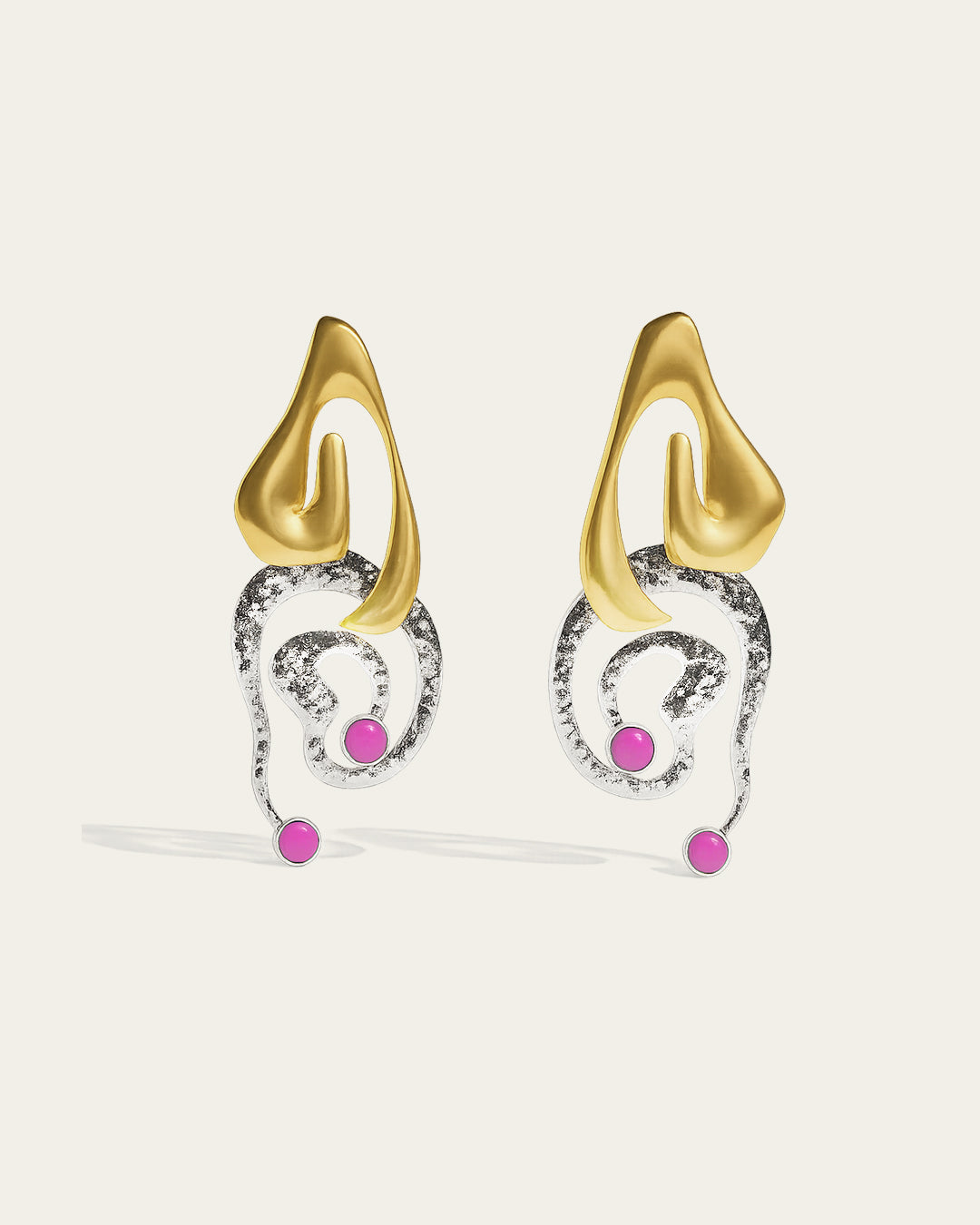 Clyra gold plated earrings featuring an elegant curved design with a high-polish finish and organic texture.