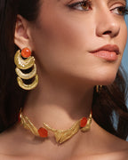 Handcrafted 18k gold plated Ghosoun stone choker with a textured branch aesthetic, suhail gold drop earrings with a celestial-inspired sunburst design