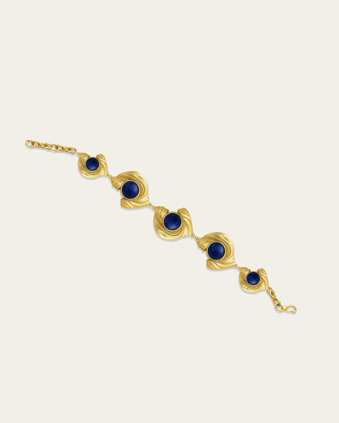 Statement Glema beaded bracelet in 18k gold plated metal with a signature pearl-and-shell focal point