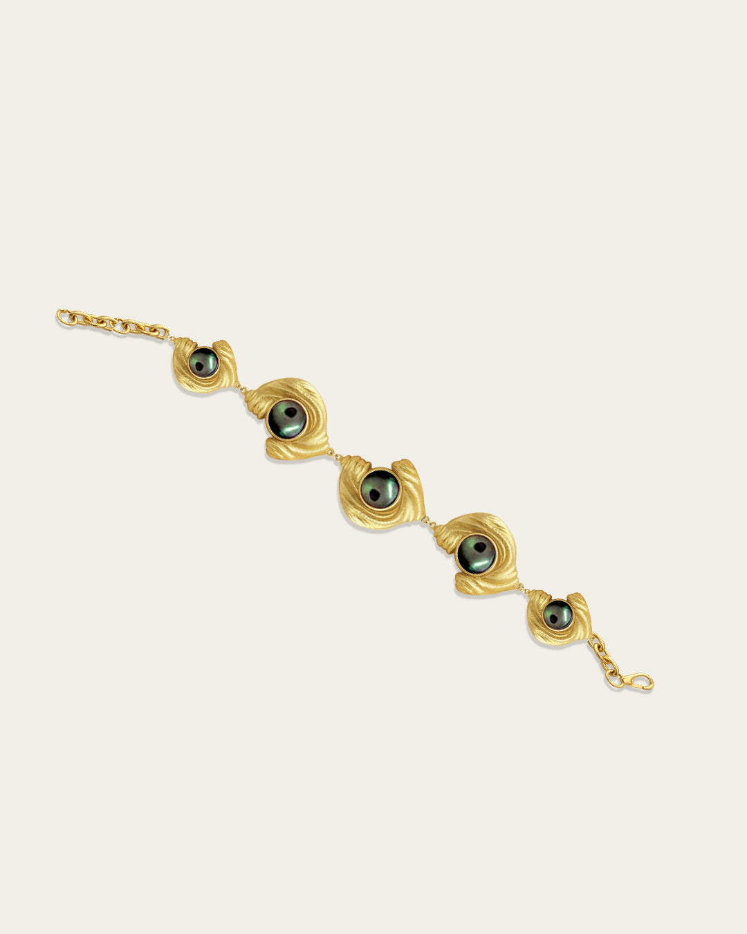 Statement Glema beaded bracelet in 18k gold plated metal with a signature pearl-and-shell focal point