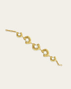 Statement Glema beaded bracelet in 18k gold plated metal with a signature pearl-and-shell focal point