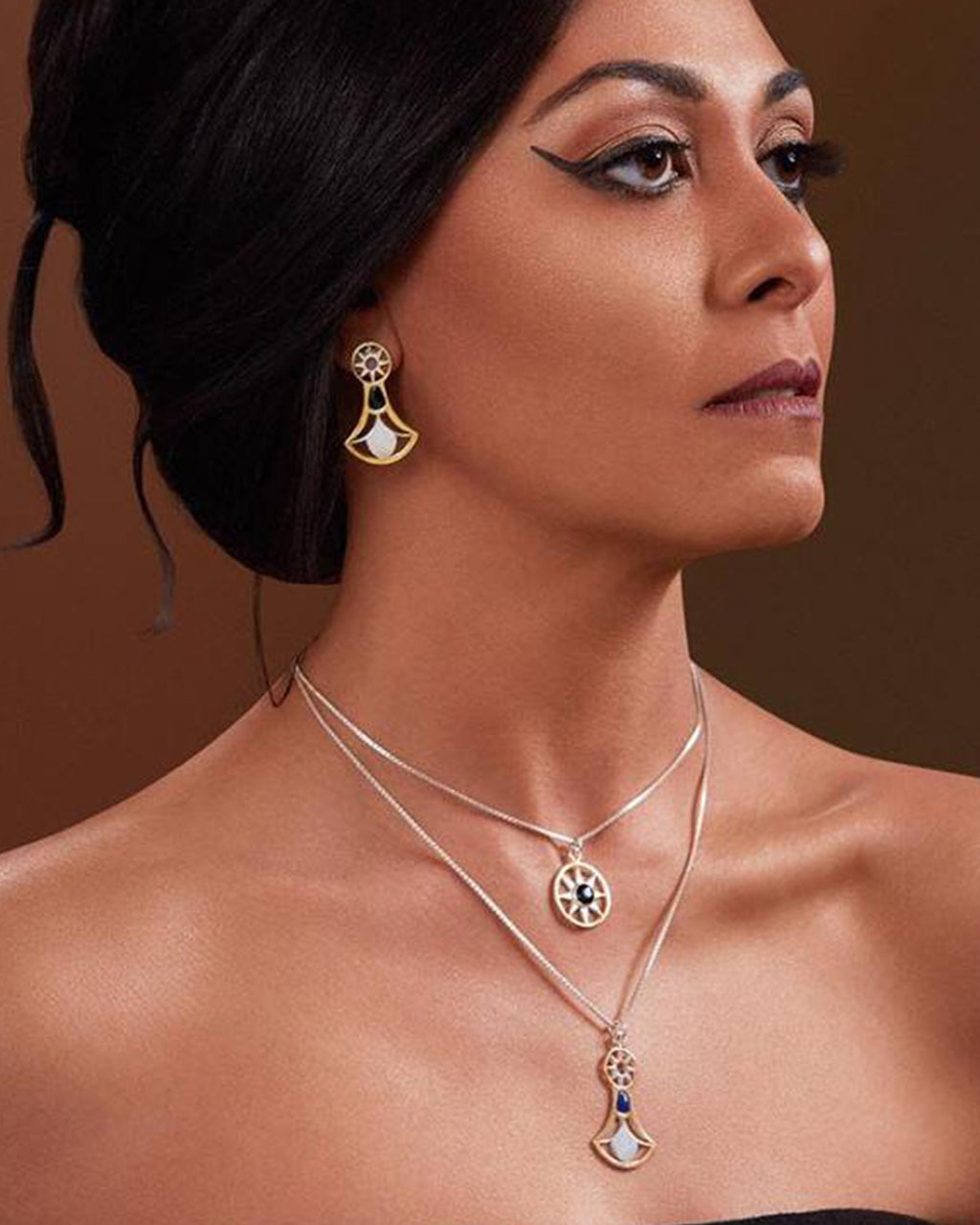 Lotus pendant necklace featuring a 925 sterling silver flower with a thin 18k gold plated outline