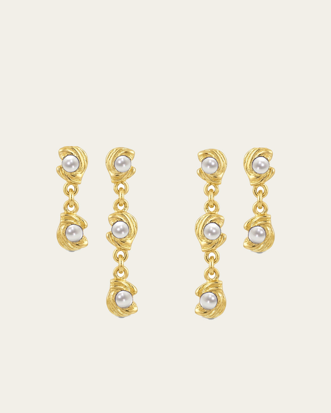 Mini Glema earrings stack in 18K gold-plated brass with all in white seashell stones, shown as a coordinated drop-earring bundle with built-in 15% discount.