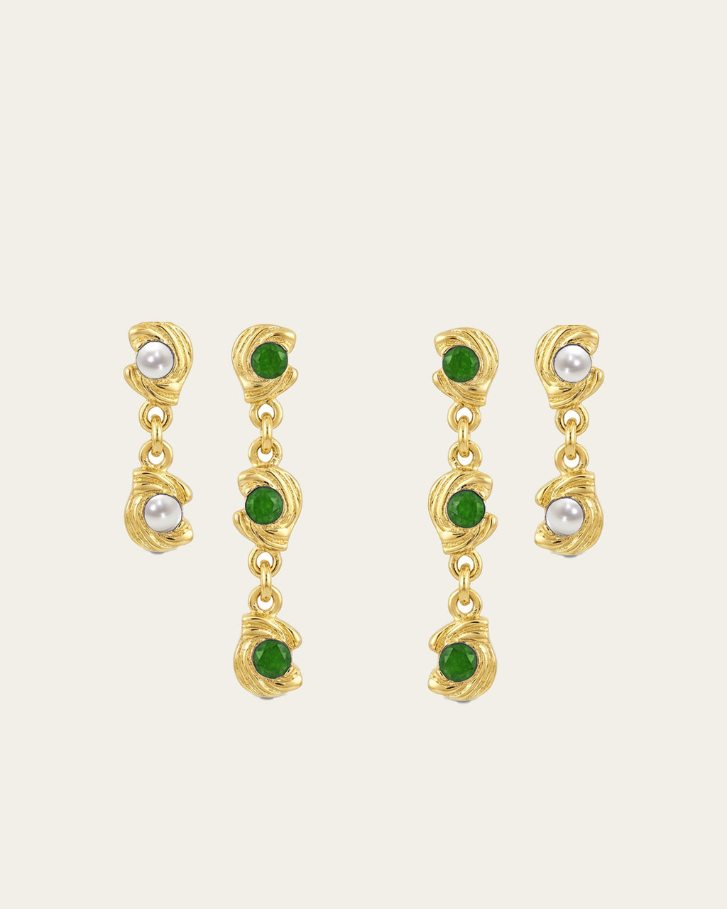 Mini Glema earrings stack in 18K gold-plated brass with green stones and white seashell details, shown as a coordinated drop-earring bundle with built-in 15% discount.