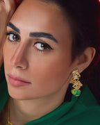 Onda 18k gold plated ring with a continuous wave-like band and a polished, contemporary aesthetic