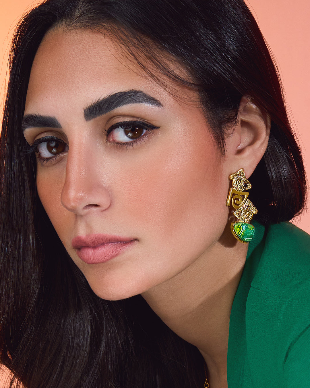 Onda 18k gold plated ring with a continuous wave-like band and a polished, contemporary aesthetic