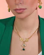 Polished 18k gold plated Onda wave necklace, a modern minimalist piece inspired by flowing water.