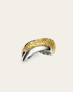 Rivera ring in 18k gold plated and rhodium finishes with a unique open-work sculptural wave design, Mixed-metal Rivera ring with rhodium and 18k gold plating, a modern geometric band for stacking