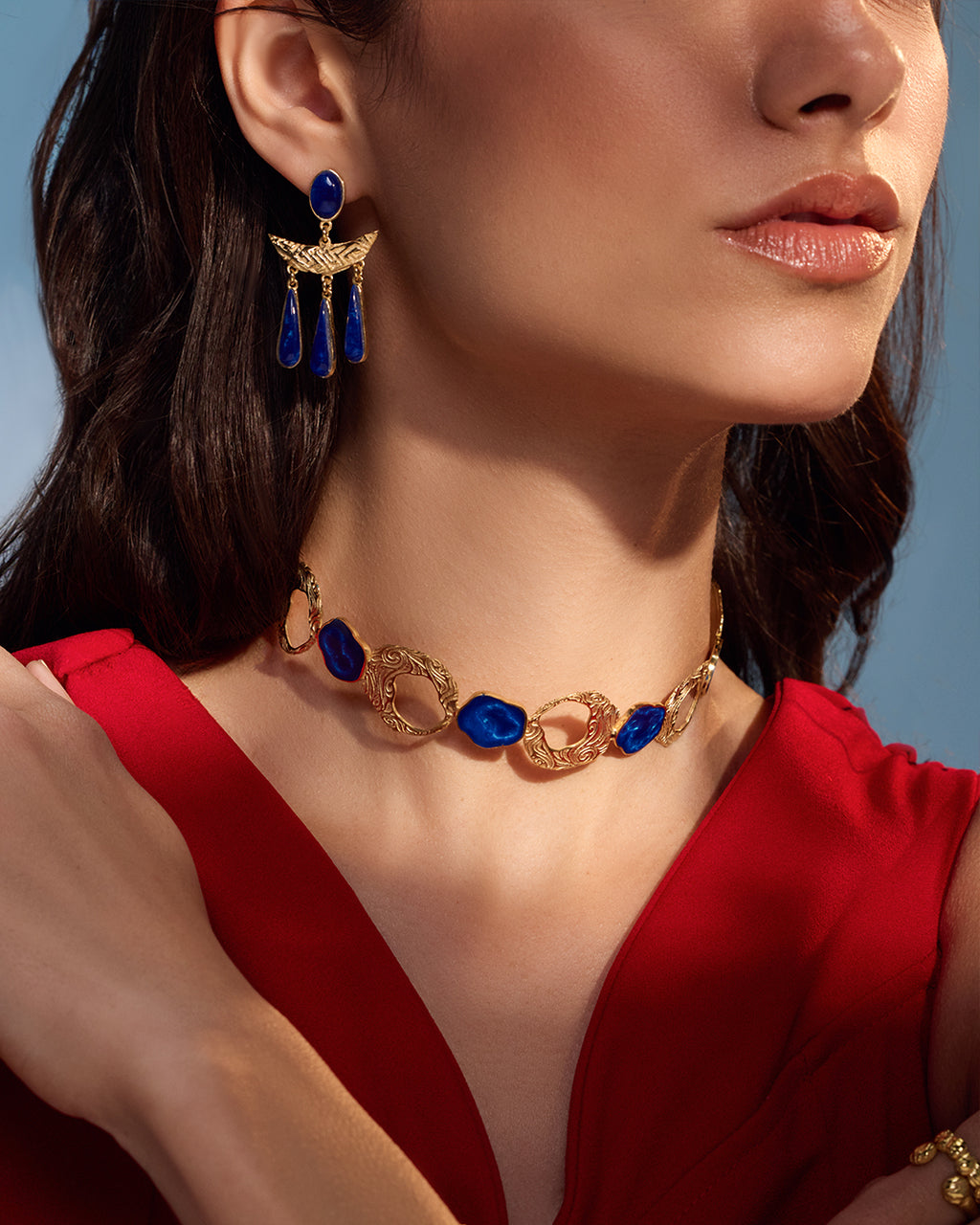 Gold Teif jewelry set with emerald green enamel choker, textured open cuff, and malachite-style drop earrings