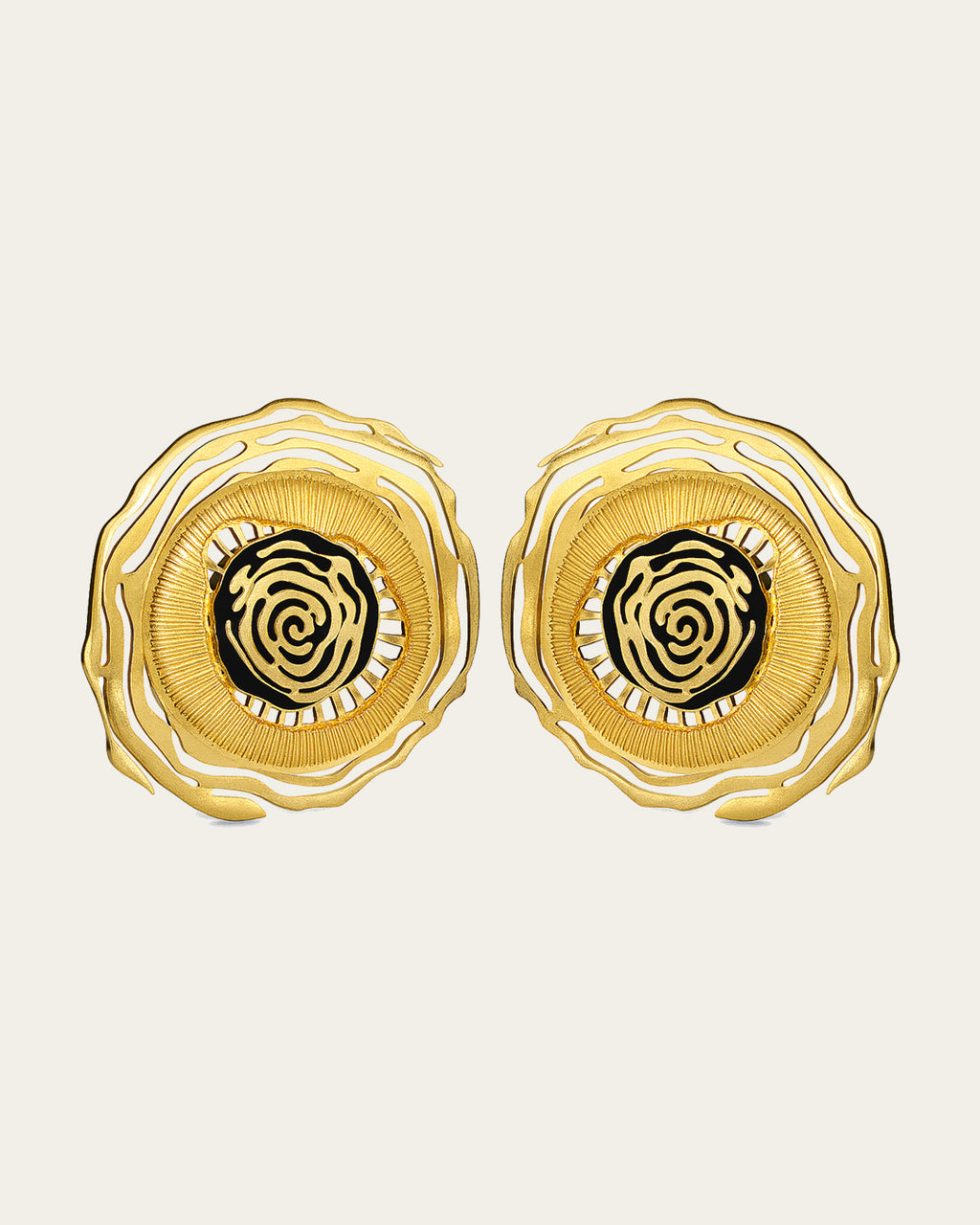Whirl 18k gold plated earrings featuring dynamic spiral designs and a textured gold finish
