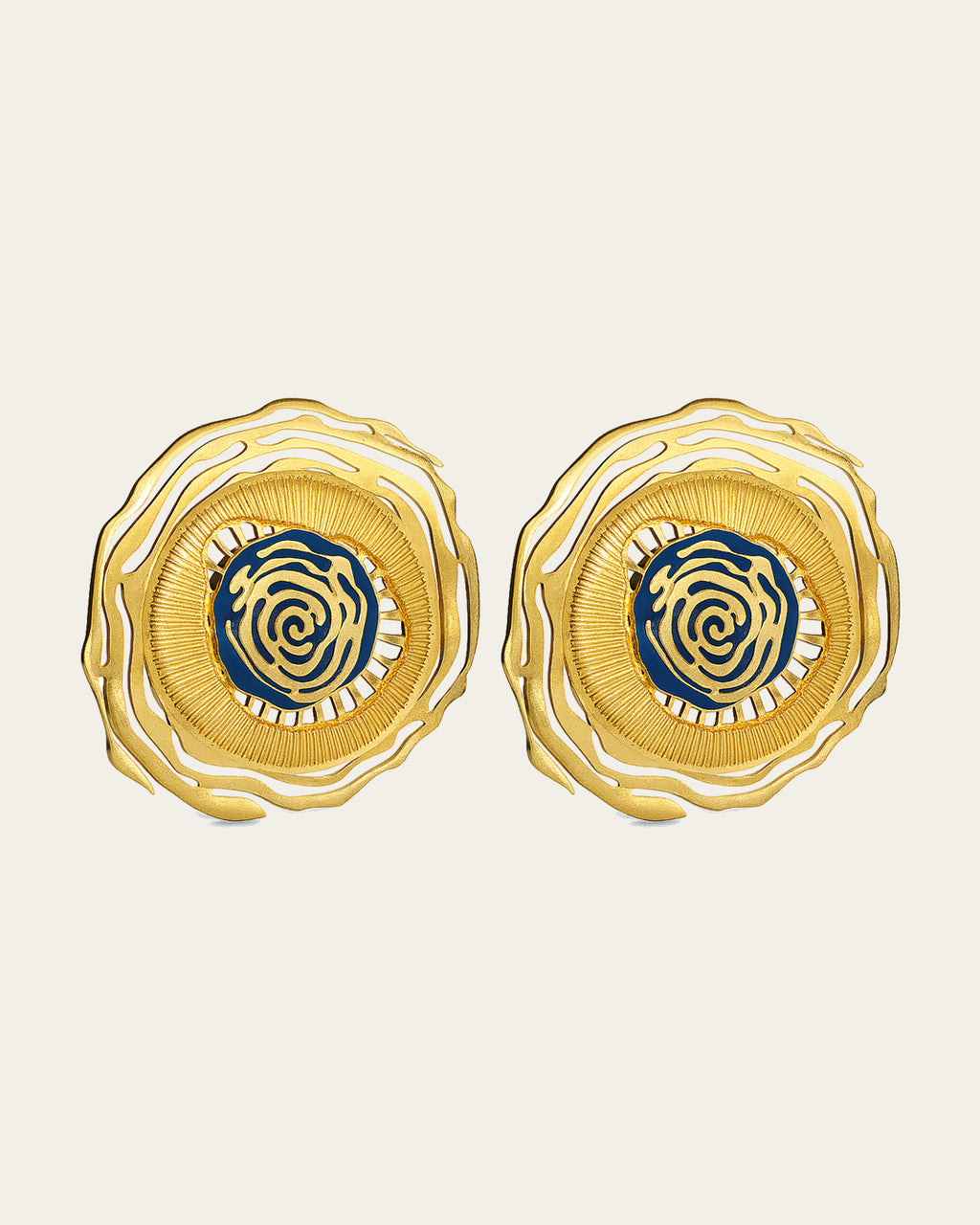 Whirl 18k gold plated earrings featuring dynamic spiral designs and a textured gold finish