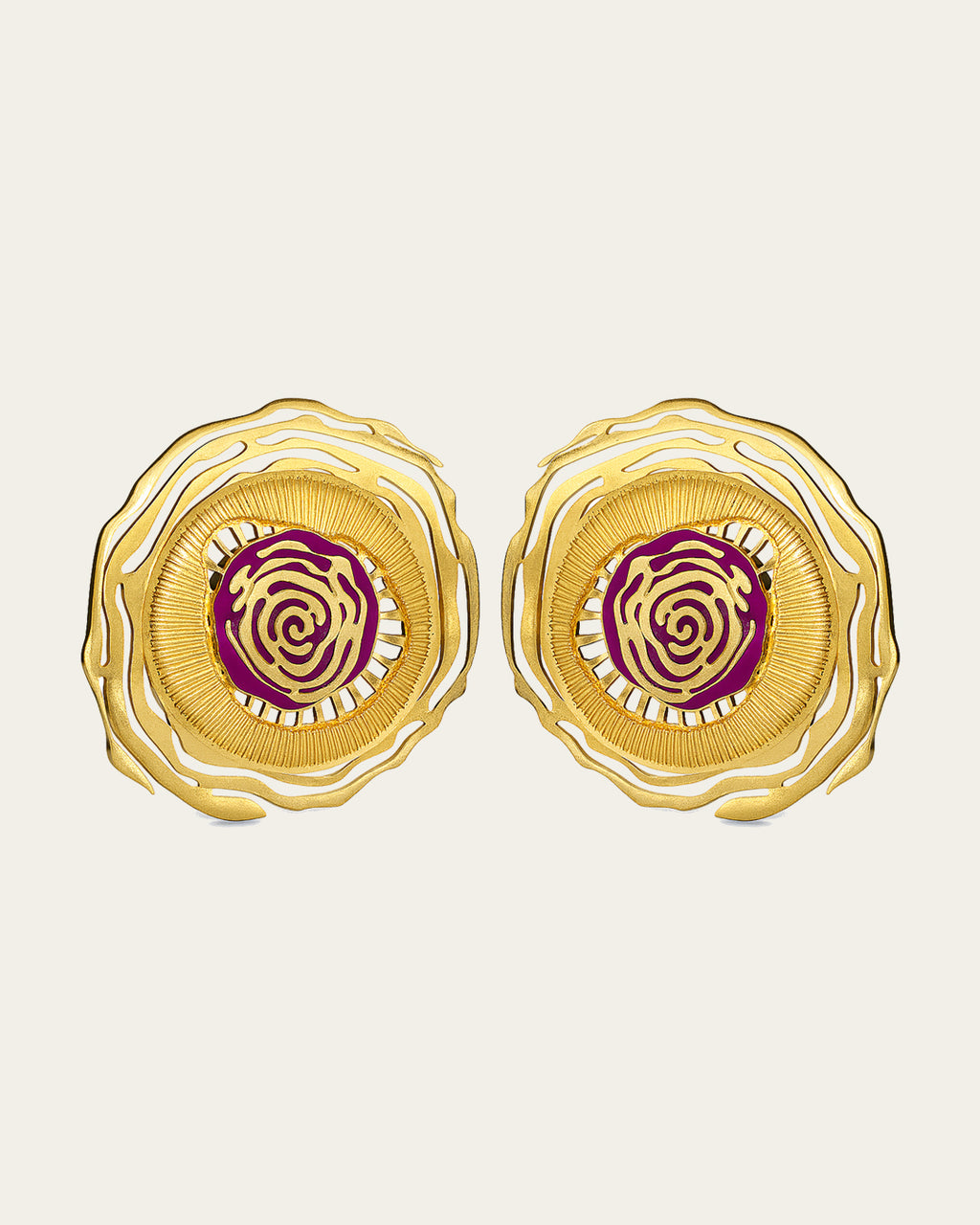 Whirl 18k gold plated jewelry set featuring dynamic spiral designs and a textured gold finish