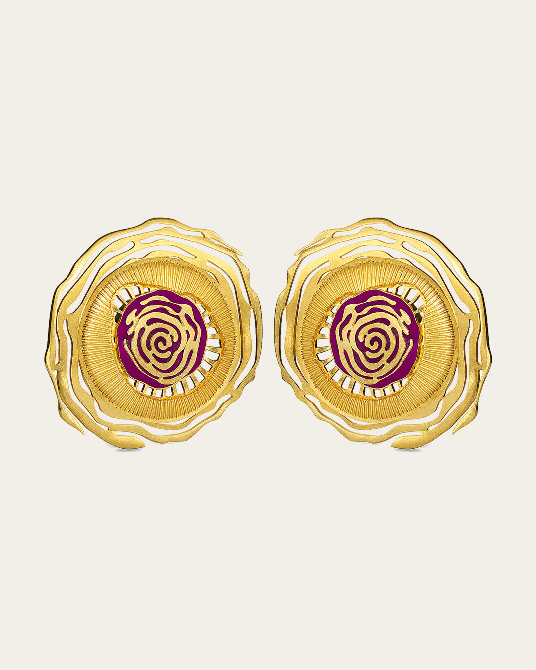 Whirl 18k gold plated jewelry set featuring dynamic spiral designs and a textured gold finish